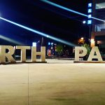 north park mini park sign at night