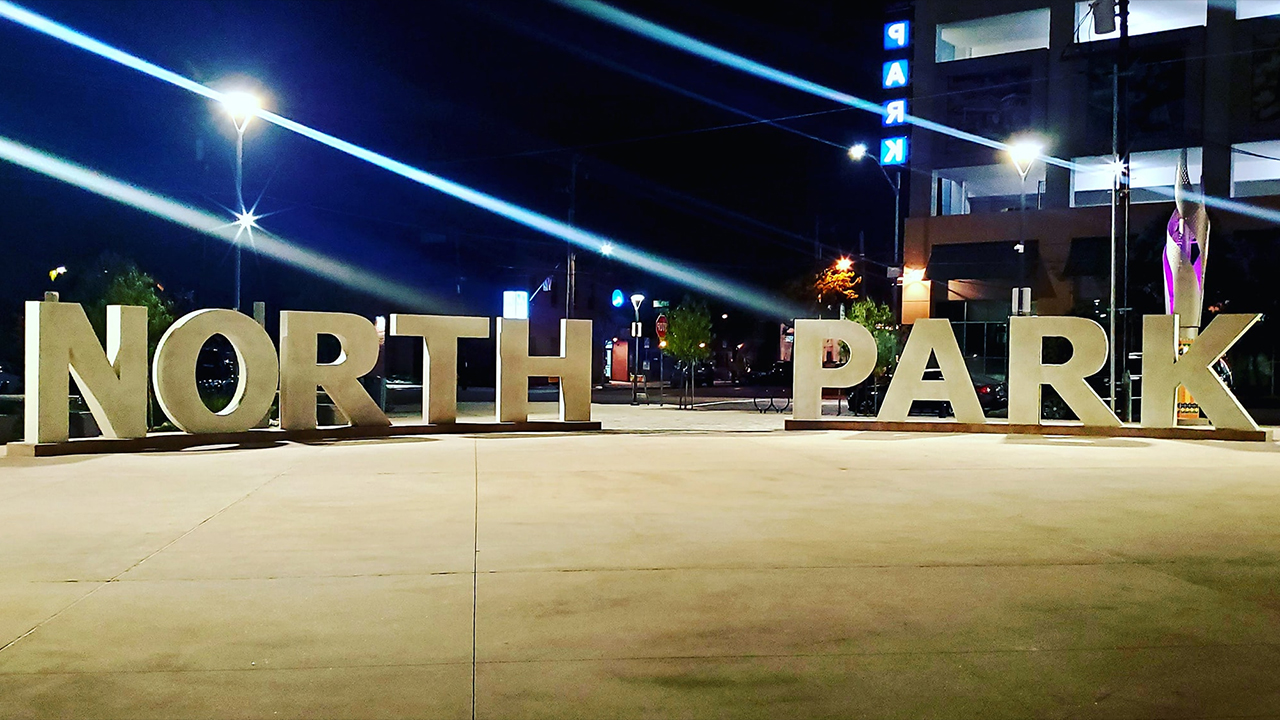 north park mini park sign at night